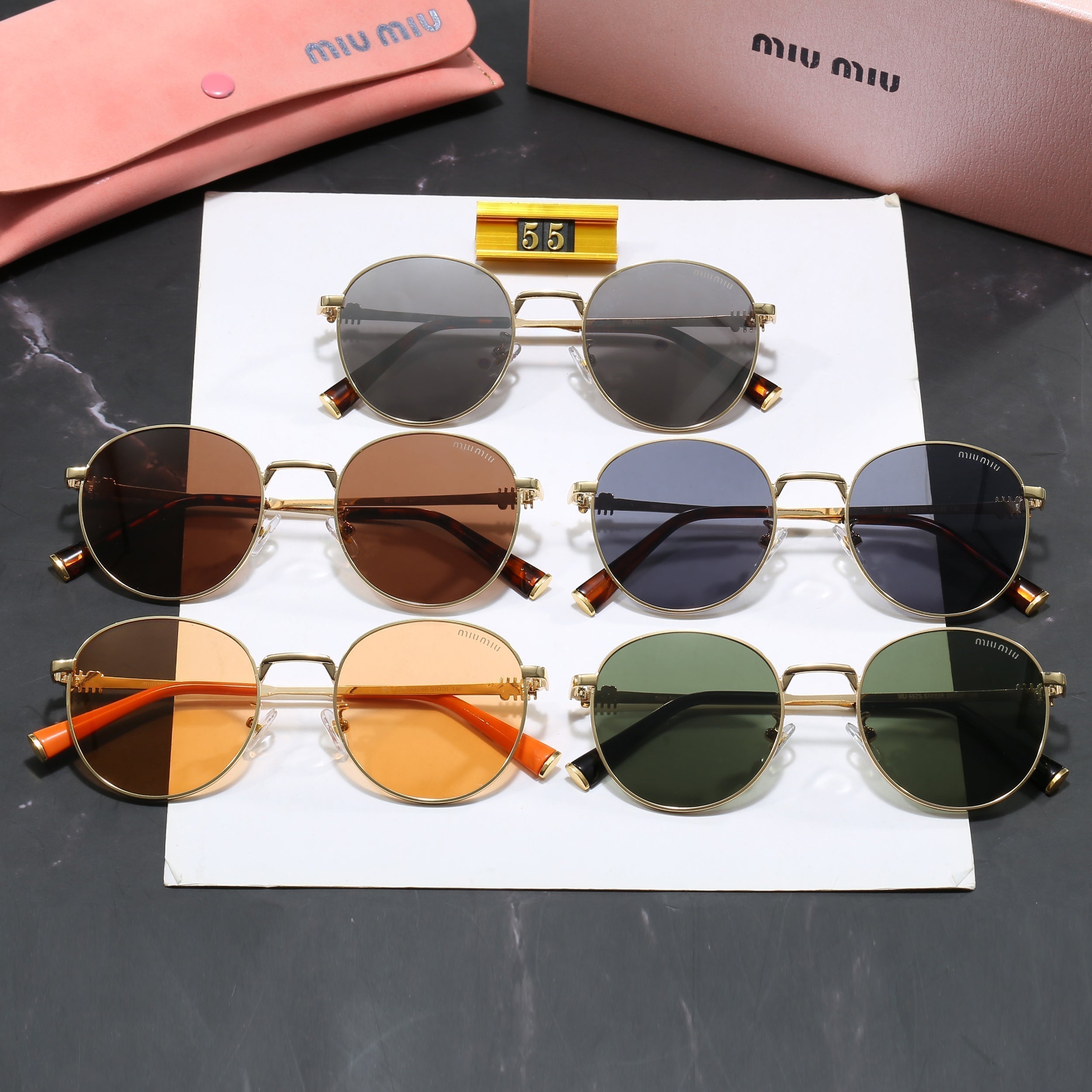 Miu Miu Occhiali da Sole Rotondi