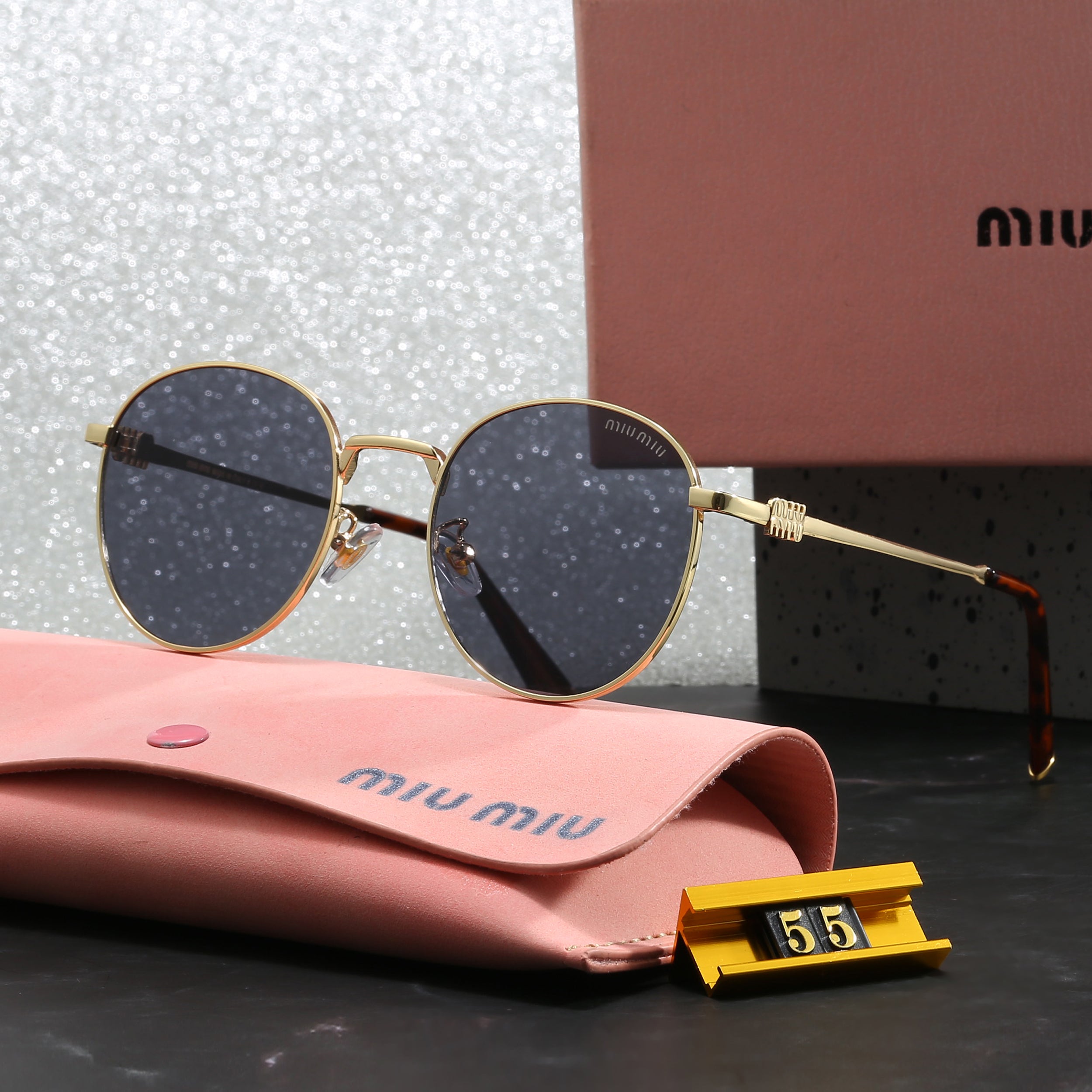 Miu Miu Occhiali da Sole Rotondi