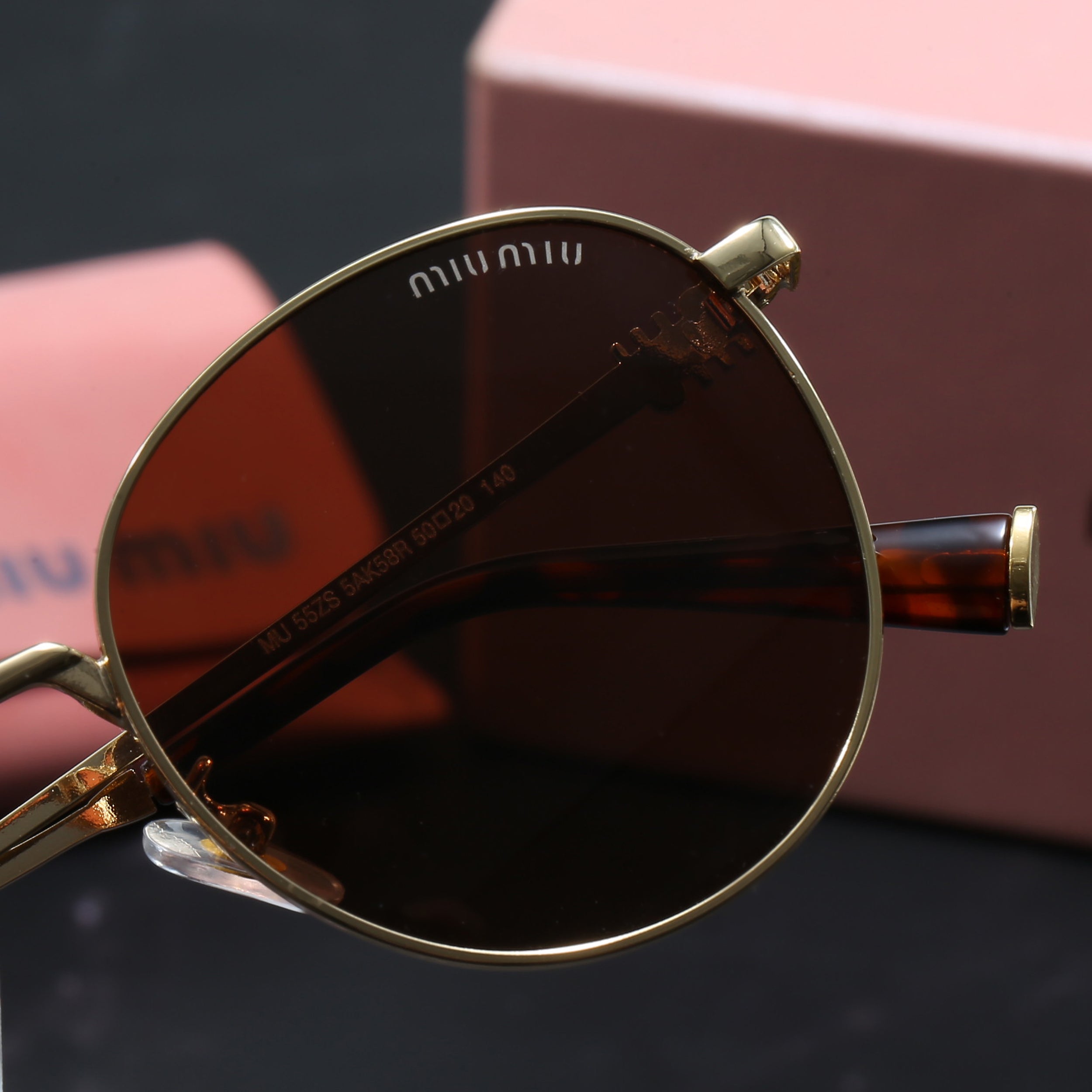 Miu Miu Occhiali da Sole Rotondi
